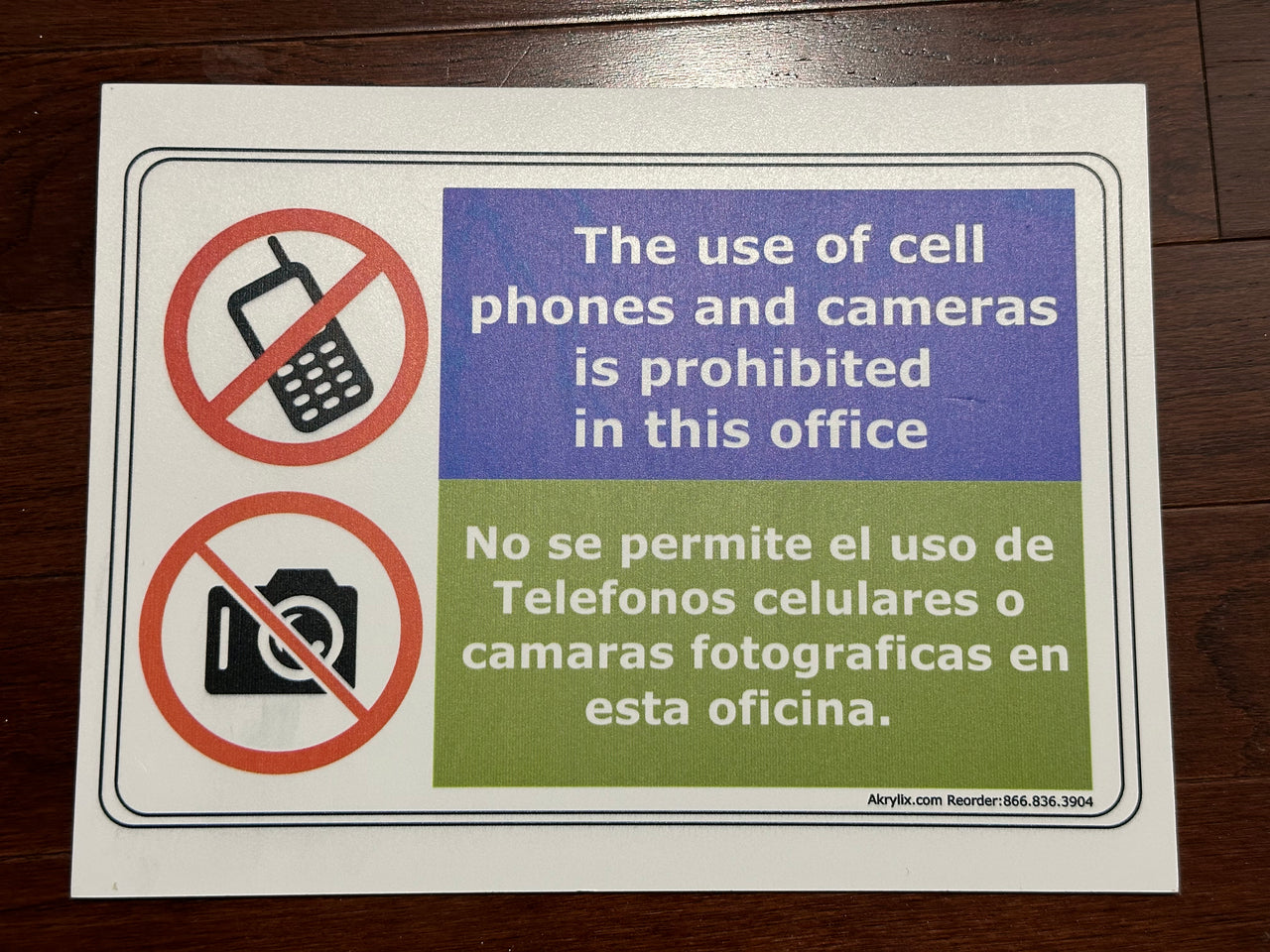 The Use of Cell Phones and Cameras is Prohibited in This Office Sign (English & Spanish)